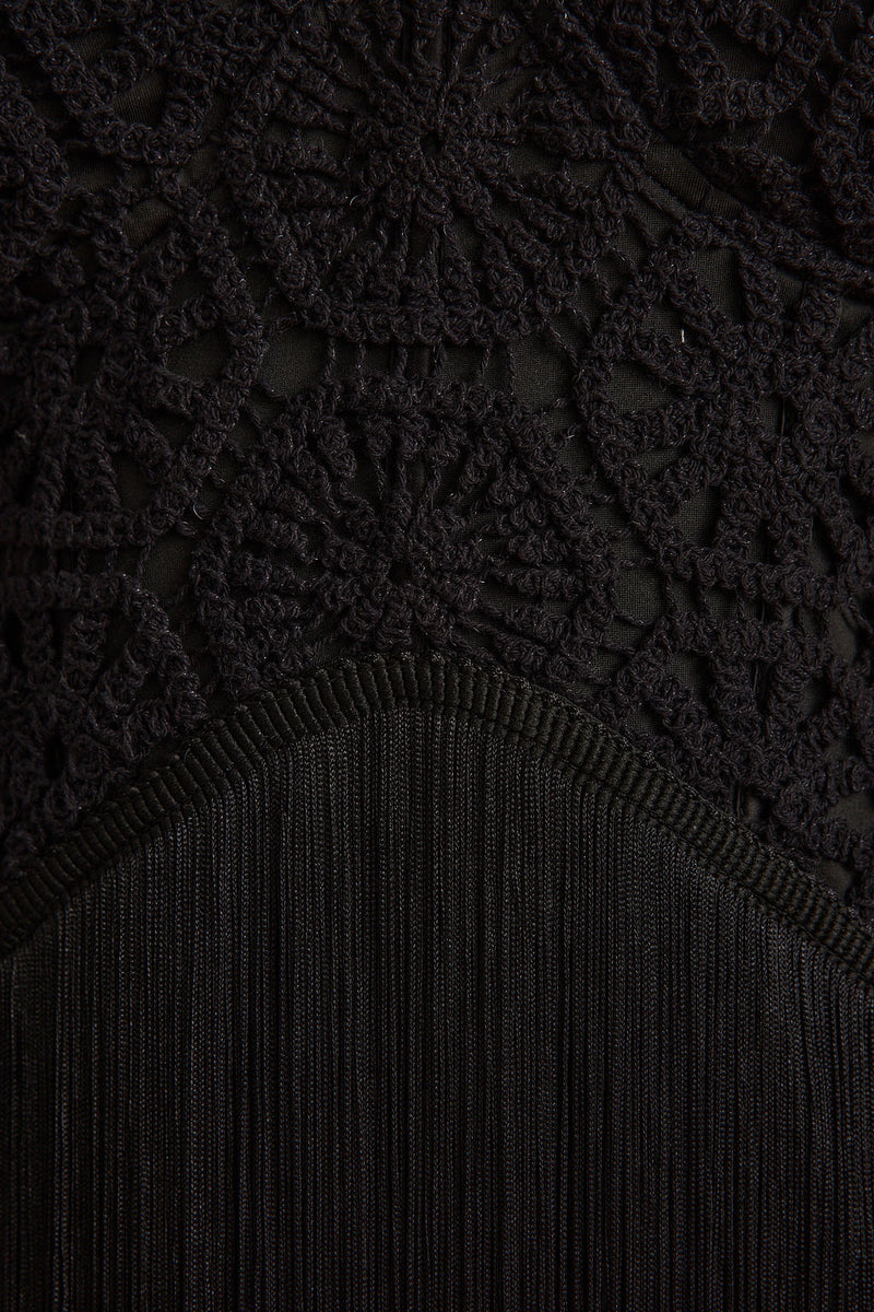 Additional view of the Finnley Black Crochet Fringe Mini Dress from a different perspective.