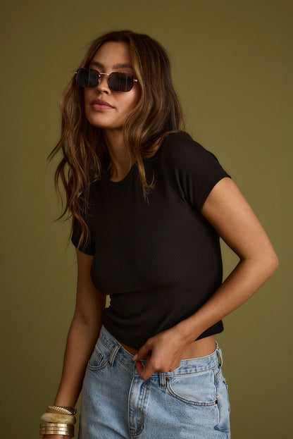 Abby Black Ribbed Crew Neck Tee styled in a complete look from an alternate angle.