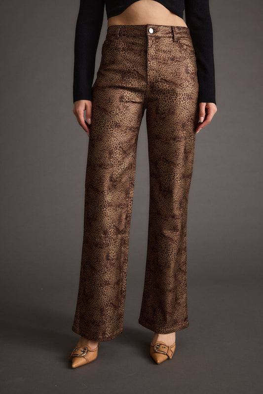 Leopard print pants with refined detailing and a flattering silhouette.