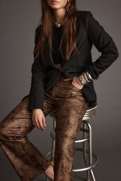 After Hours Coated Leopard Pants paired with complementary accessories for a polished look.