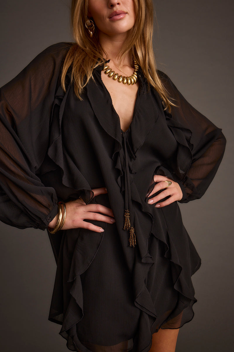 Detail shot of the Alice Black Chiffon Mini Dress highlighting the chiffon elements.