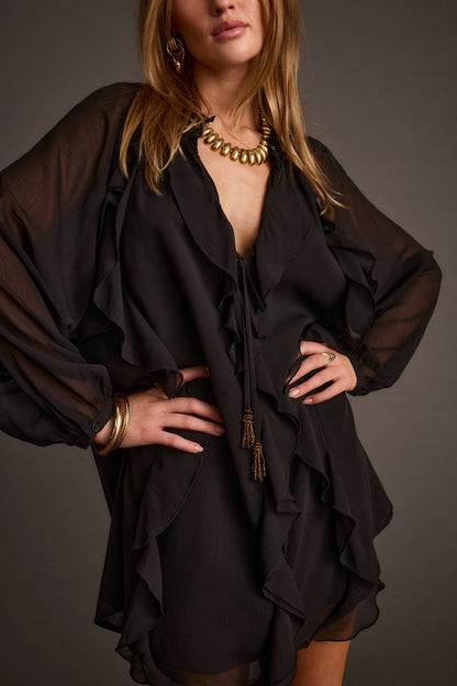 Detail shot of the Alice Black Chiffon Mini Dress highlighting the chiffon elements.