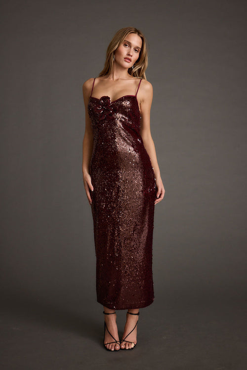 Sequin midi dress with accents and a flattering silhouette.