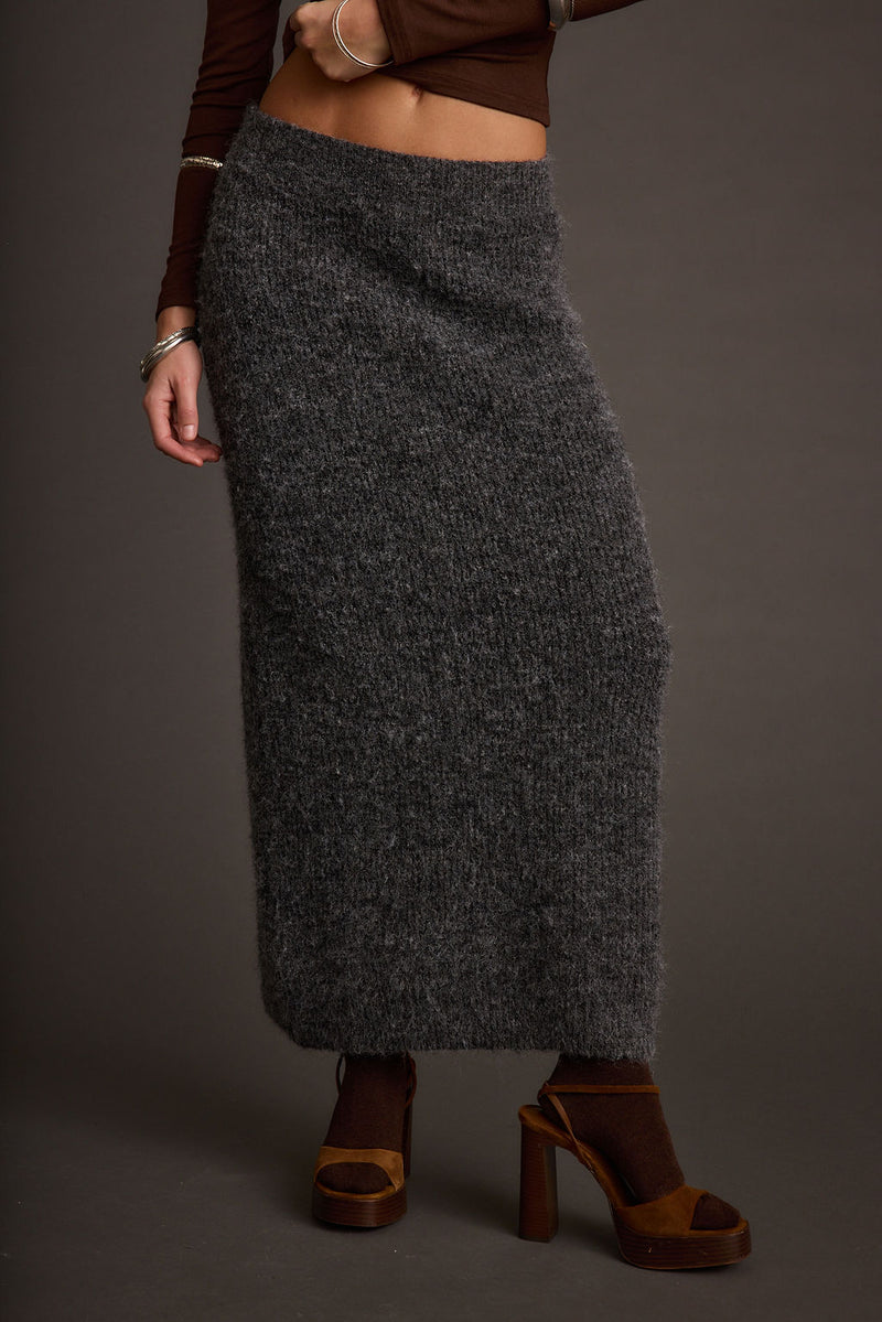 Back view of the sweater showing the silhouette and fit.