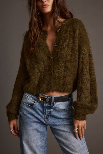 Olive cropped cardigan with refined detailing and a flattering silhouette.