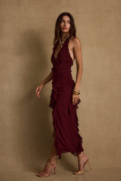 Aria Merlot Halter Maxi Dress paired with complementary accessories for a polished look.
