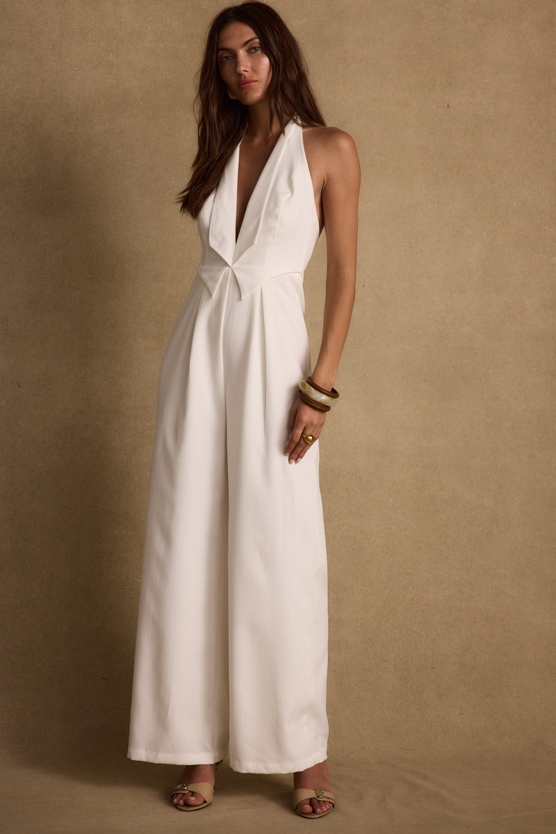Astoria White Plunge Halter Tailored Jumpsuit styled in a complete look from an alternate angle.
