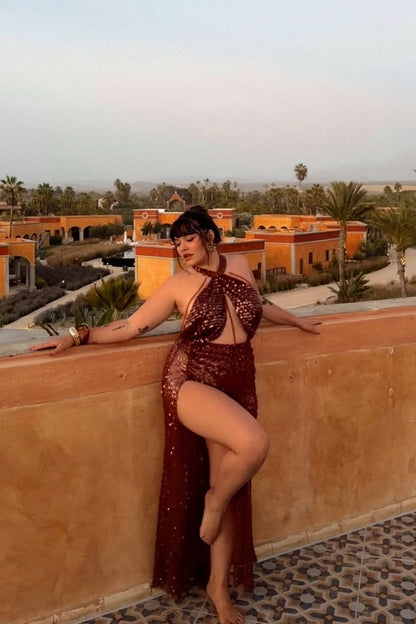 Back view of the bronze sequin maxi dress showing the silhouette and fit.