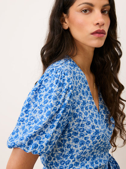 LOUISA blue Rose Radieuse floral blouse worn on a model, full-length view by Rouje