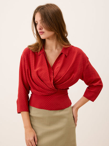 SILVIA red plumetis polka-dot crossover blouse, front view by Rouje