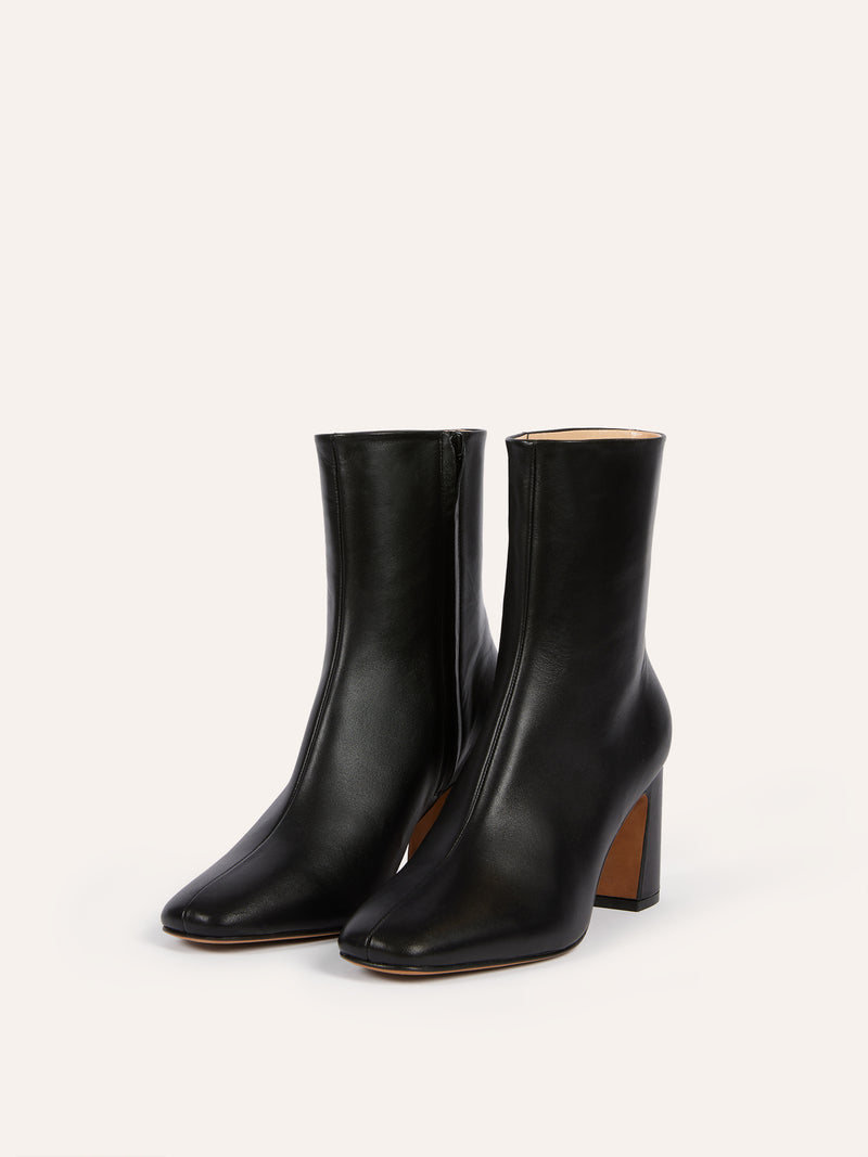 CLAUDIA black leather ankle boots, side view by Rouje