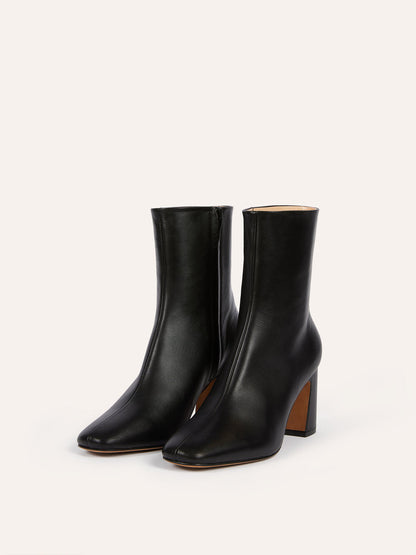 CLAUDIA black leather ankle boots, side view by Rouje