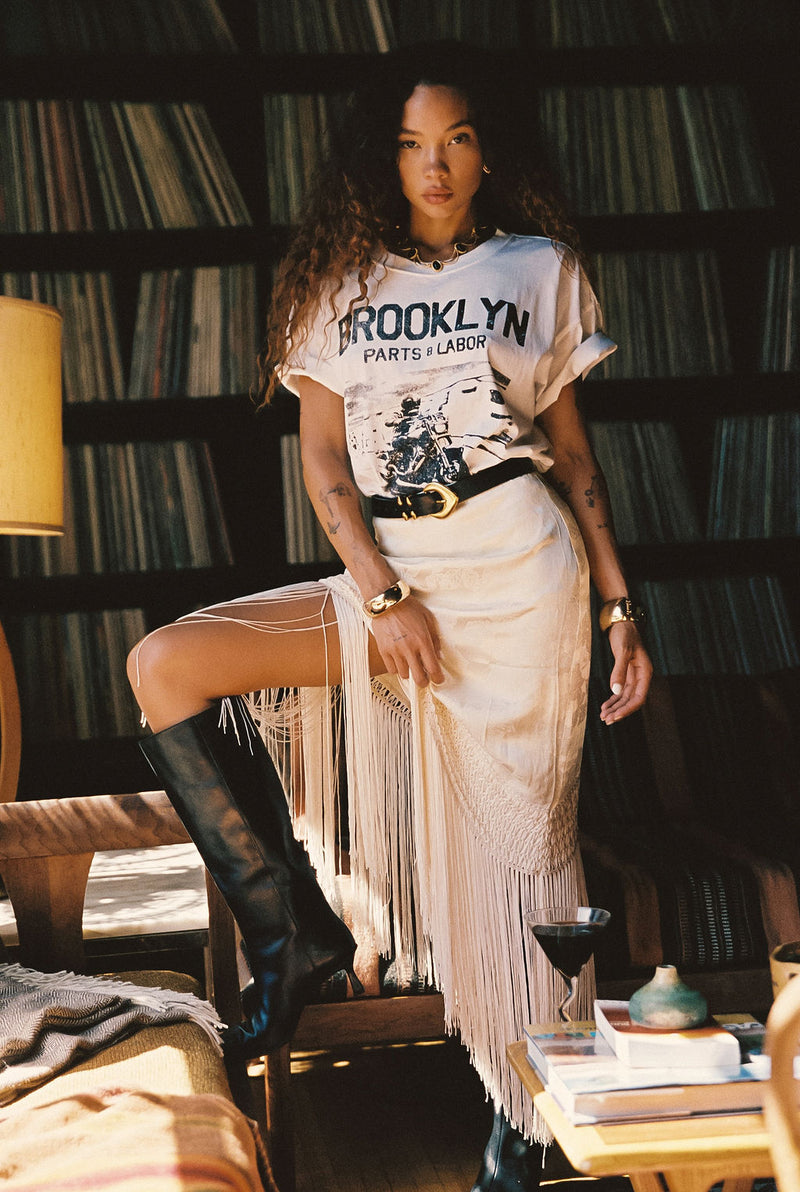 Detail shot of the Brooklyn White Graphic Boyfriend Tee highlighting the design elements.