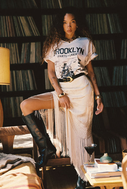 Detail shot of the Brooklyn White Graphic Boyfriend Tee highlighting the design elements.