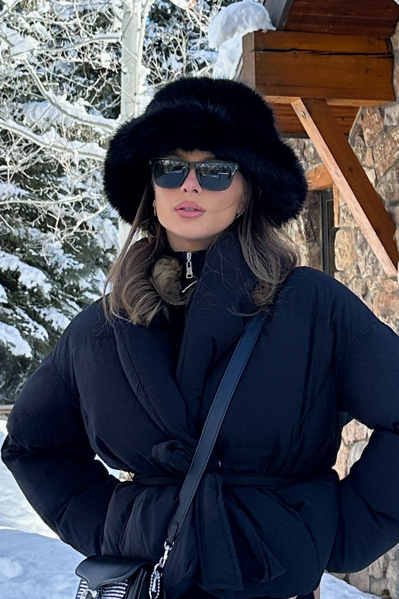 Close-up of the Bucket Down Black Faux Fur Hat showcasing the faux fur texture and craftsmanship.