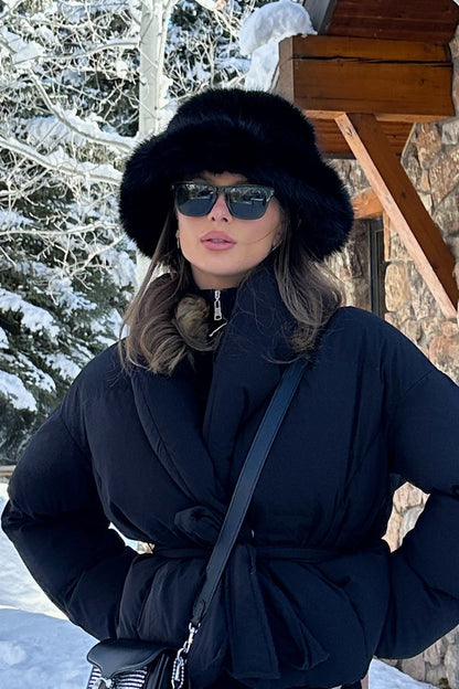 Close-up of the Bucket Down Black Faux Fur Hat showcasing the faux fur texture and craftsmanship.