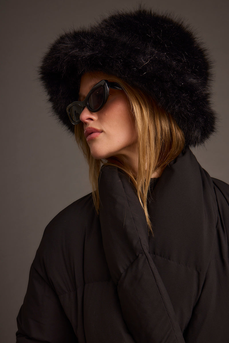 Additional view of the Bucket Down Black Faux Fur Hat from a different perspective.