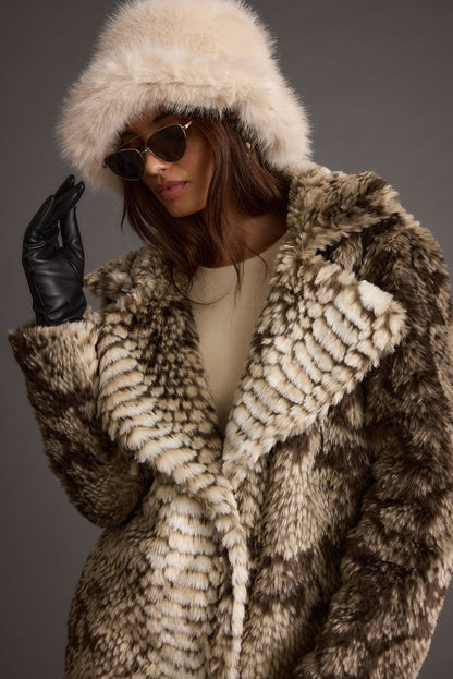 Cream faux fur hat with refined accents, a cream bucket hat essential.