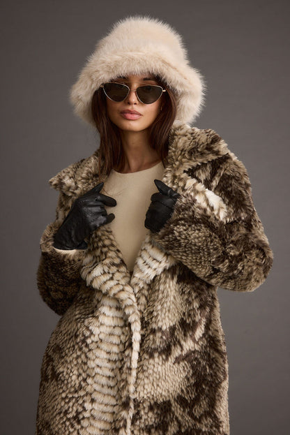 Bucket Down Cream Faux Fur Hat paired with complementary accessories for a polished look.