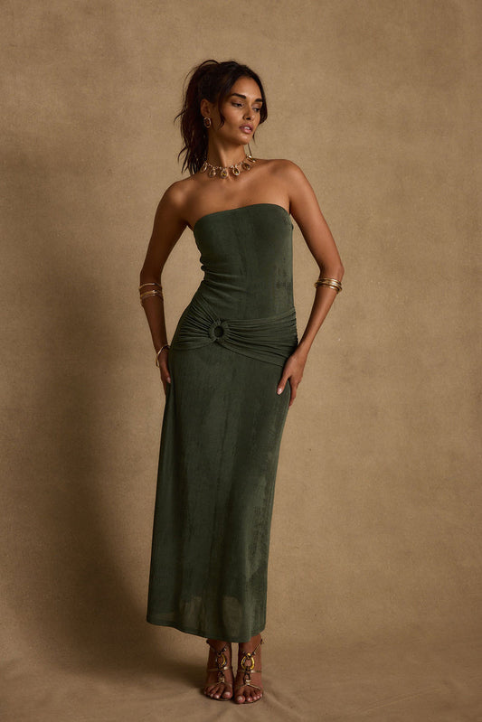 Emerald maxi dress with elegant accents, a vacation maxi dress essential.