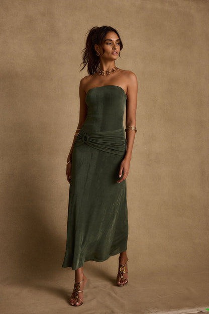 Close-up of the Cala Sol Emerald Maxi Dress showcasing the fabric texture and design details.