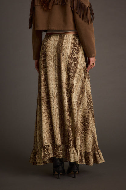 Close-up of the Calla Snake Print Maxi Skirt showcasing the fabric texture and design details.