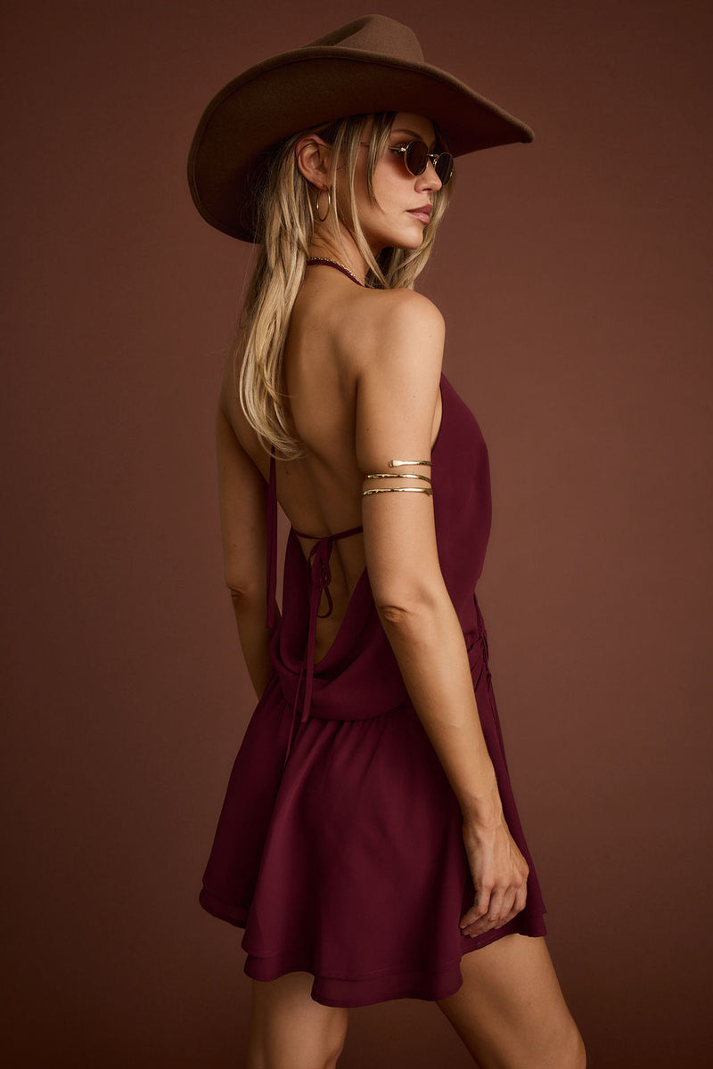 Detail shot of the Canyon Bloom Mulberry Mini Dress highlighting the design elements.