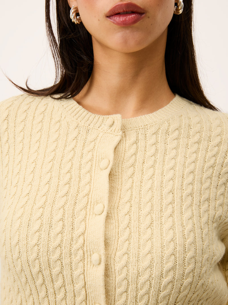 NACIM vanilla cropped cardigan worn on a model by Rouje