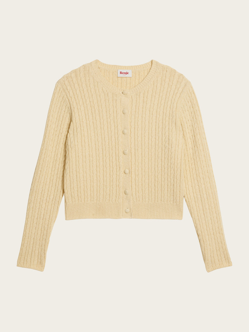 NACIM vanilla cable-knit cropped cardigan, lifestyle setting by Rouje