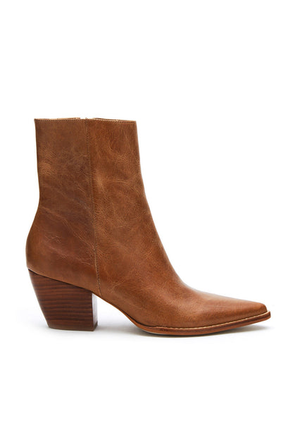 Caty Vintage Tan Boot paired with complementary accessories for a polished look.