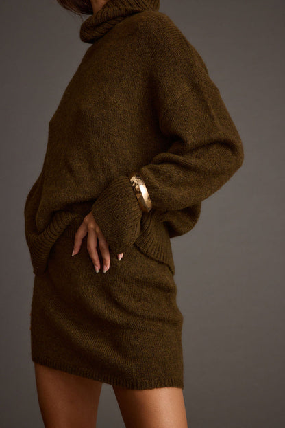 Cedar Sweater Mini Skirt paired with complementary accessories for a polished look.
