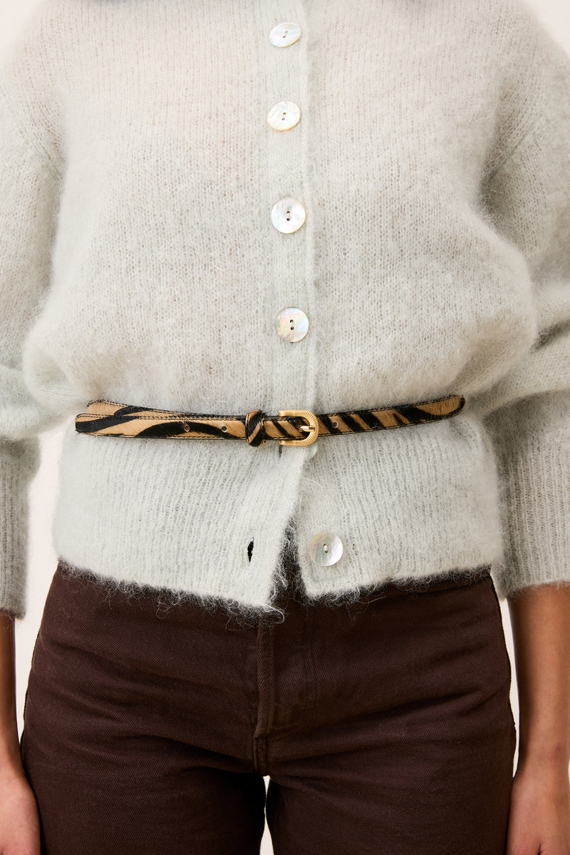 SIGNATURE zebra pony belt worn on a model by Rouje