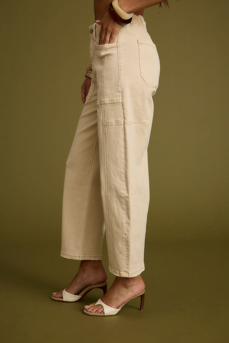 Chandler Beige Barrel Jeans paired with complementary accessories for a polished look.