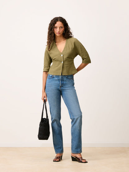 DANY olive green V-neck shirt worn on a model by Rouje