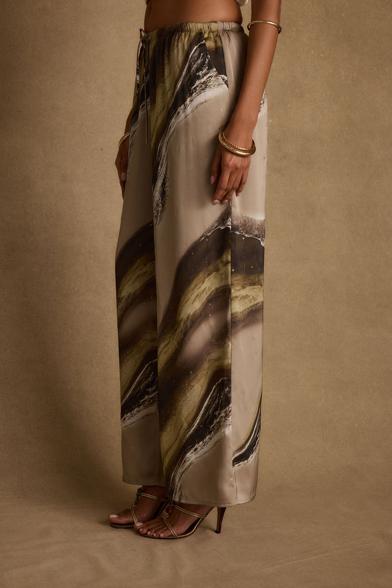 Clear Breeze Marble Satin Pants paired with complementary accessories for a polished look.