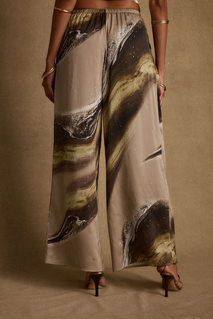 Detail shot of the Clear Breeze Marble Satin Pants highlighting the satin elements.