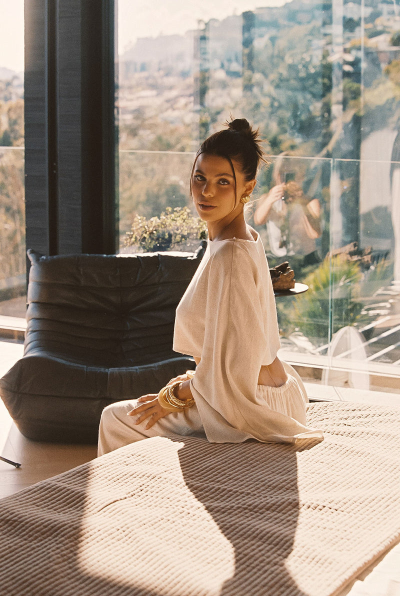 Back view of the linen top showing the silhouette and fit.
