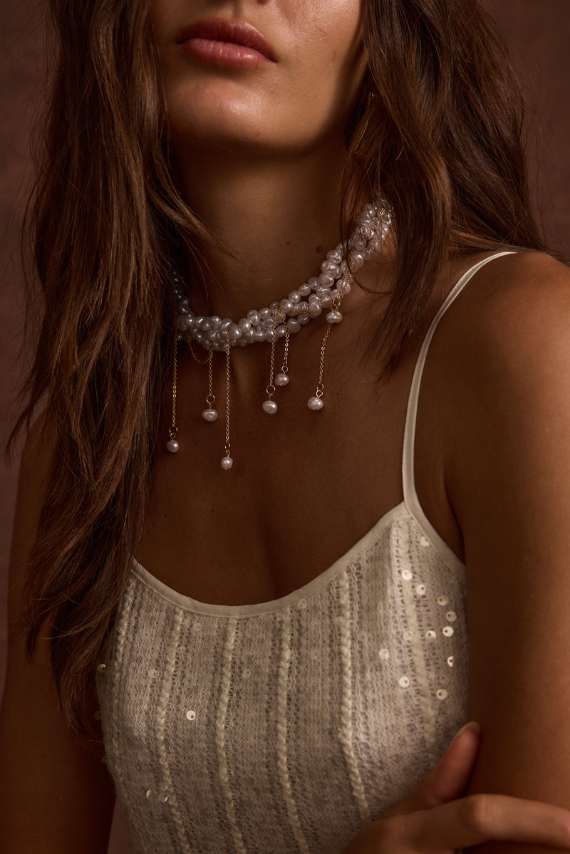 Coco Pearl Choker paired with complementary accessories for a polished look.