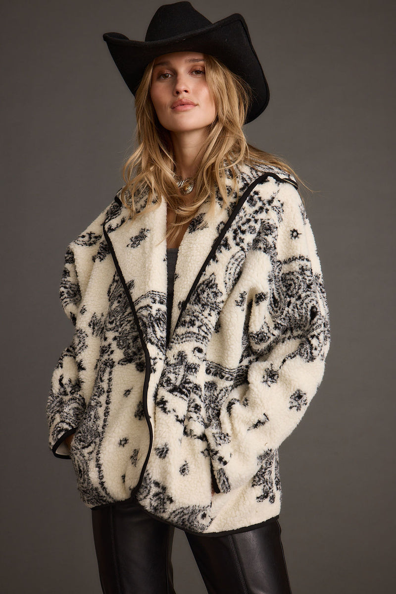Jacket with refined detailing and a flattering silhouette.