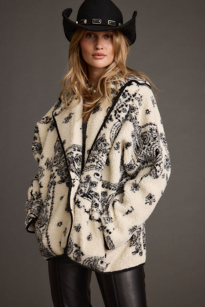 Full-length view of the jacket showing the drape and movement.