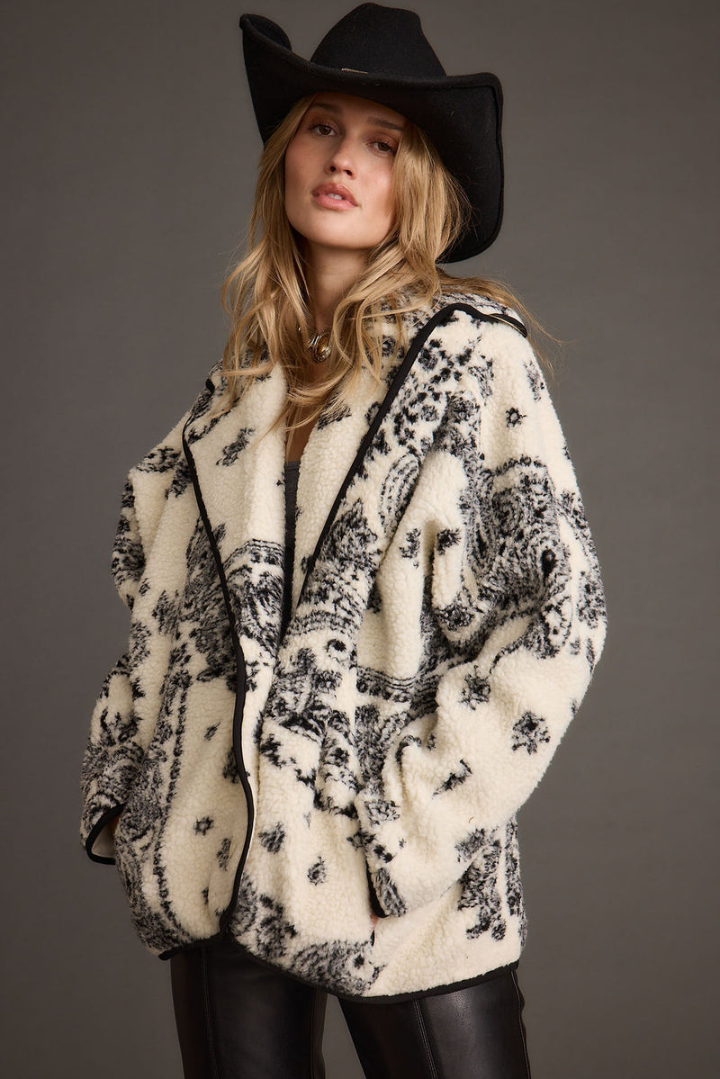 Detail shot of the Coyote Printed Sherpa Jacket highlighting the design elements.