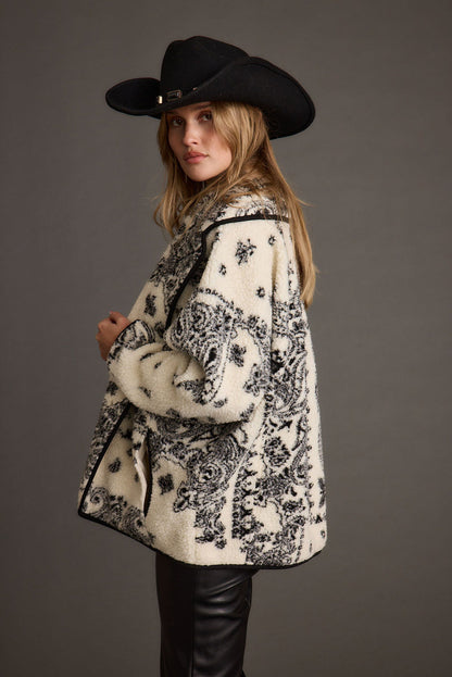 Lifestyle shot of the jacket styled for day-to-night versatility.