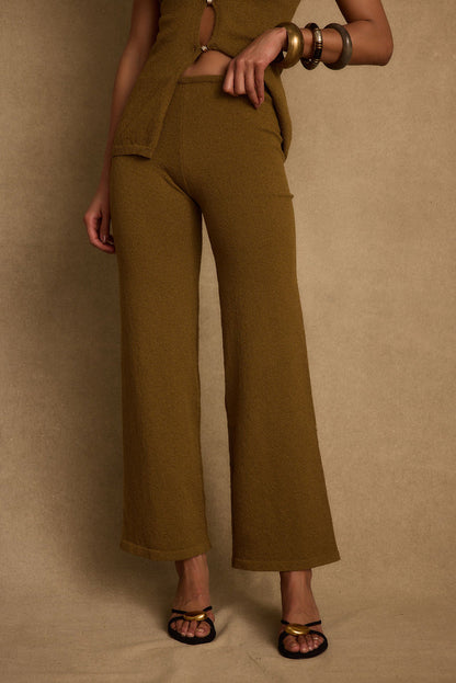 Back view of the knit pants showing the silhouette and fit.
