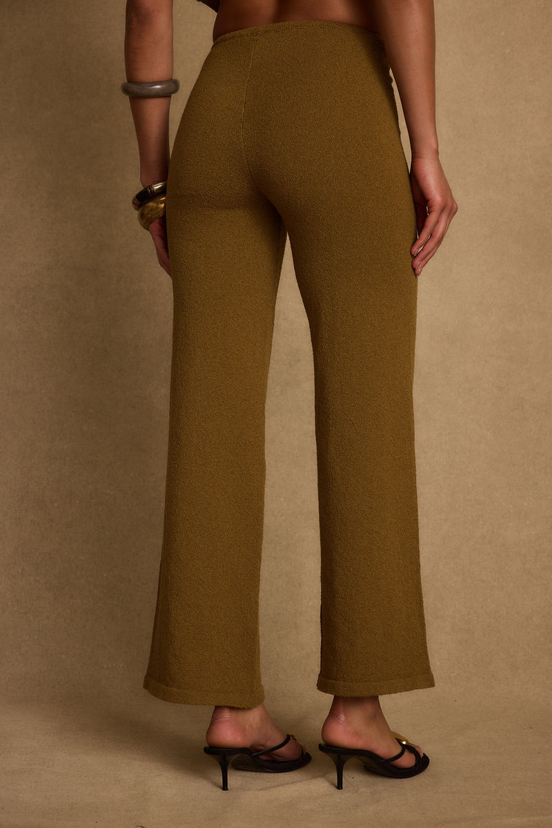 Full-length view of the pants showing the drape and movement.