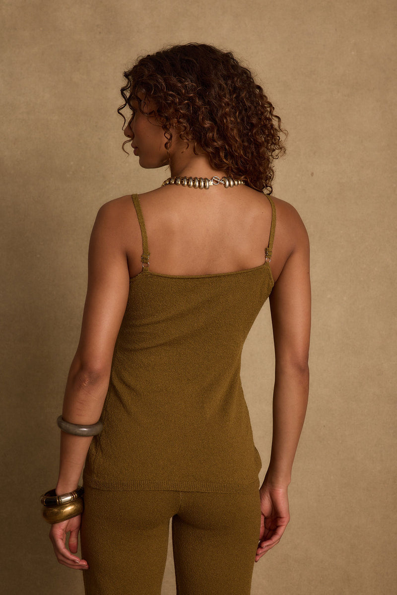 Back view of the knit top showing the silhouette and fit.