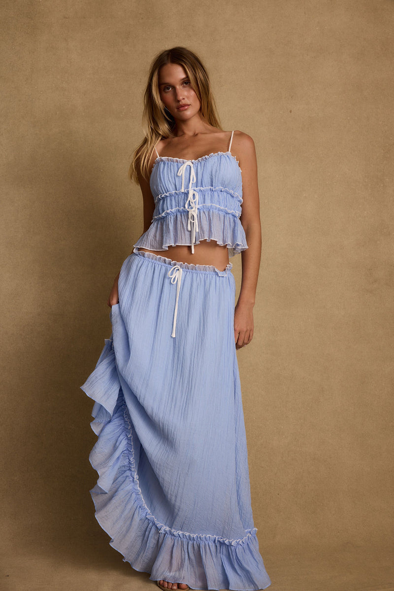 Blue maxi skirt with elegant accents, a lace maxi skirt essential.