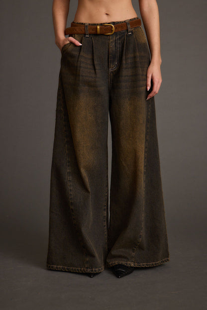 Back view of the black jeans showing the silhouette and fit.