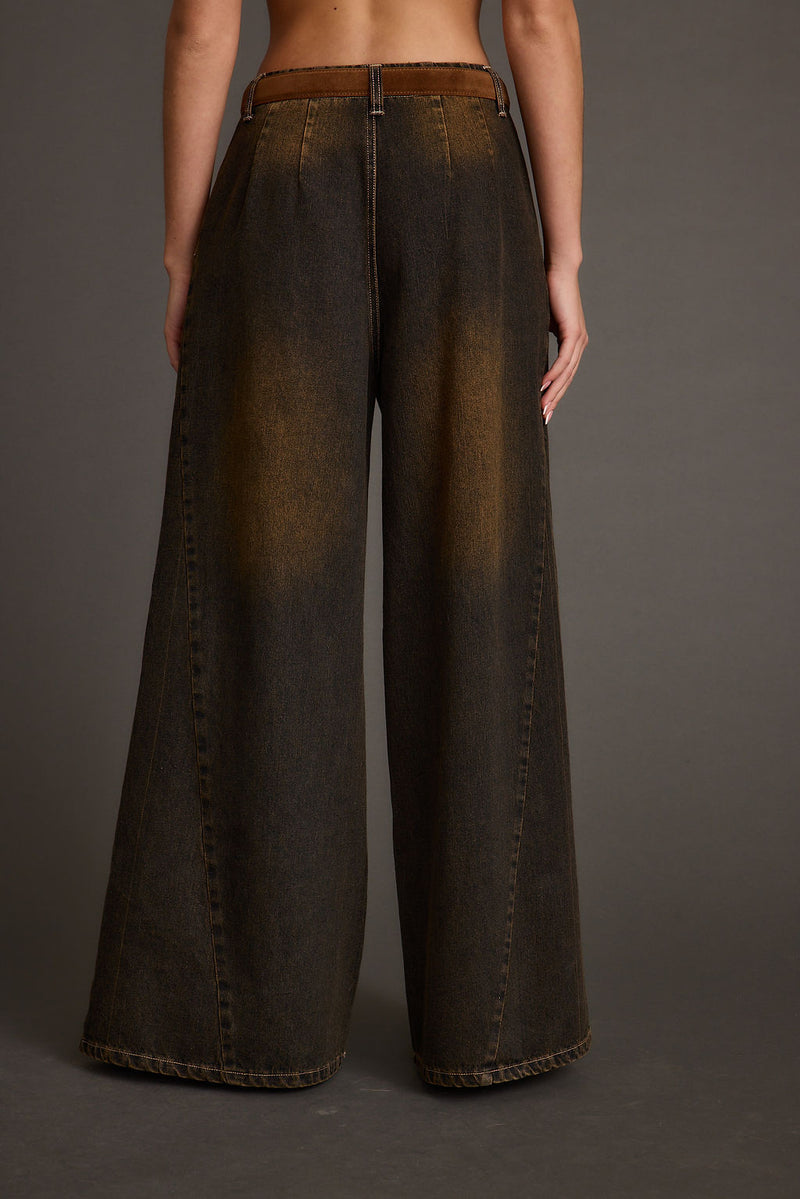 Close-up of the Dakota Washed Black Wide Leg Jeans showcasing the fabric texture and design details.