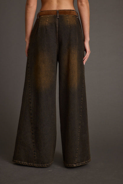 Close-up of the Dakota Washed Black Wide Leg Jeans showcasing the fabric texture and design details.