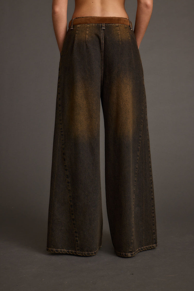 Detail shot of the Dakota Washed Black Wide Leg Jeans highlighting the wide-leg elements.